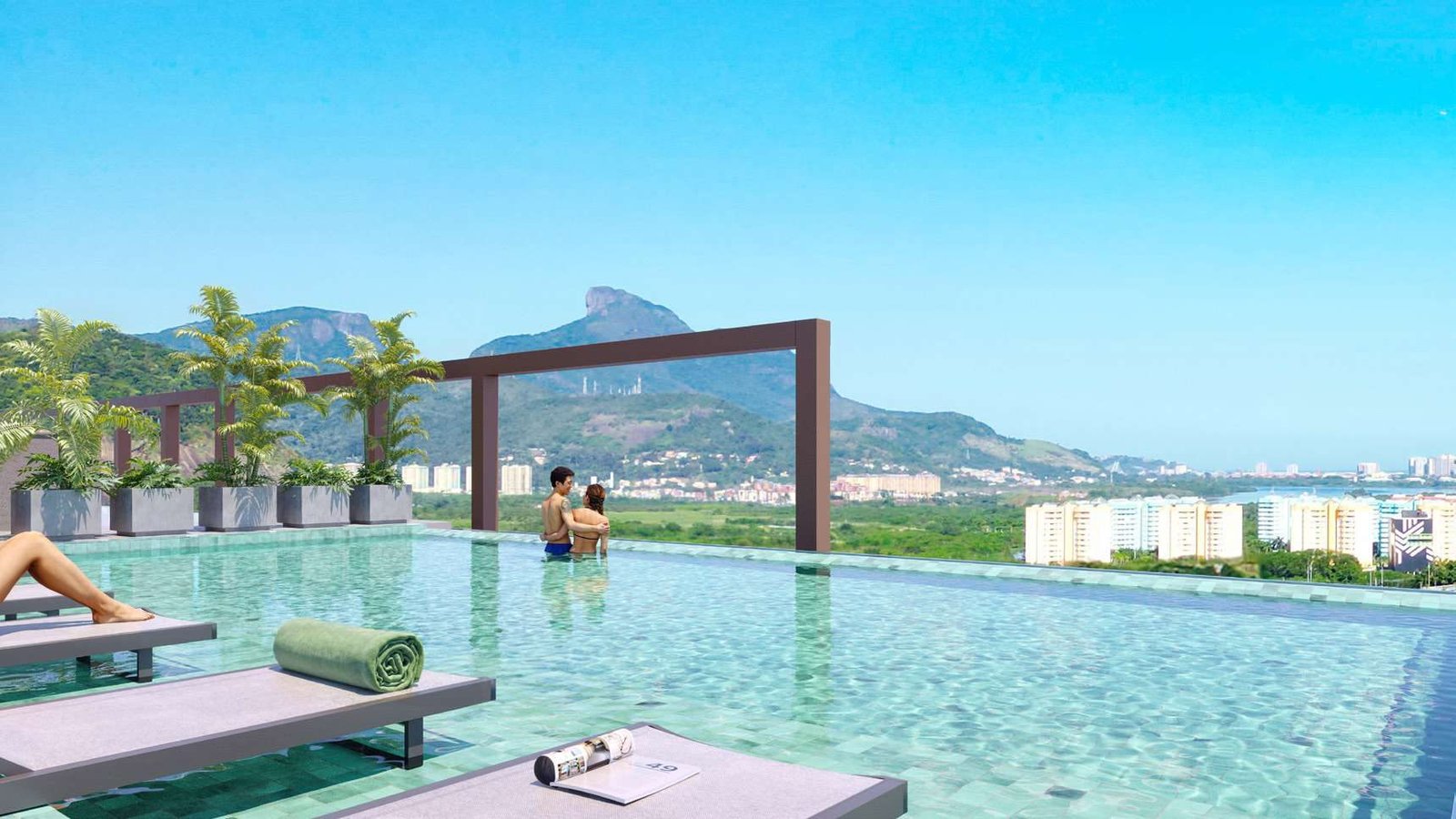 Piscina de borda infinita no rooftop do Arte Design, com vista para a Pedra da Gávea