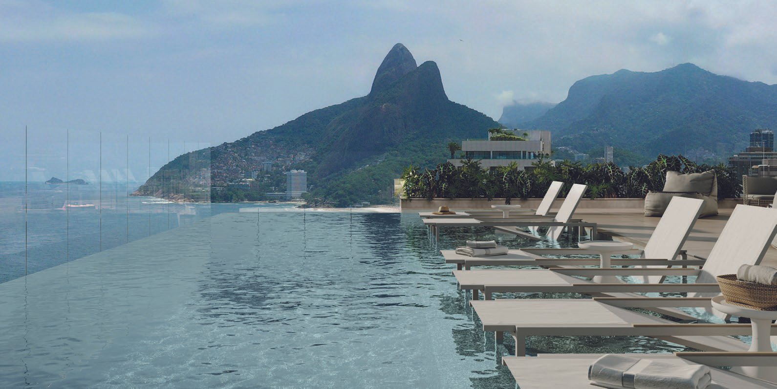 Piscina de borda infinita do IPA Studios Design com vista para o Morro Dois Irmãos