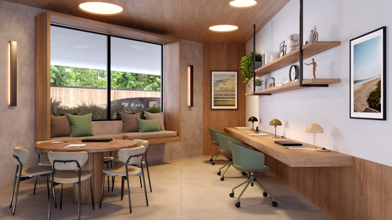 Studio decorado com bancada de trabalho e varanda integrada