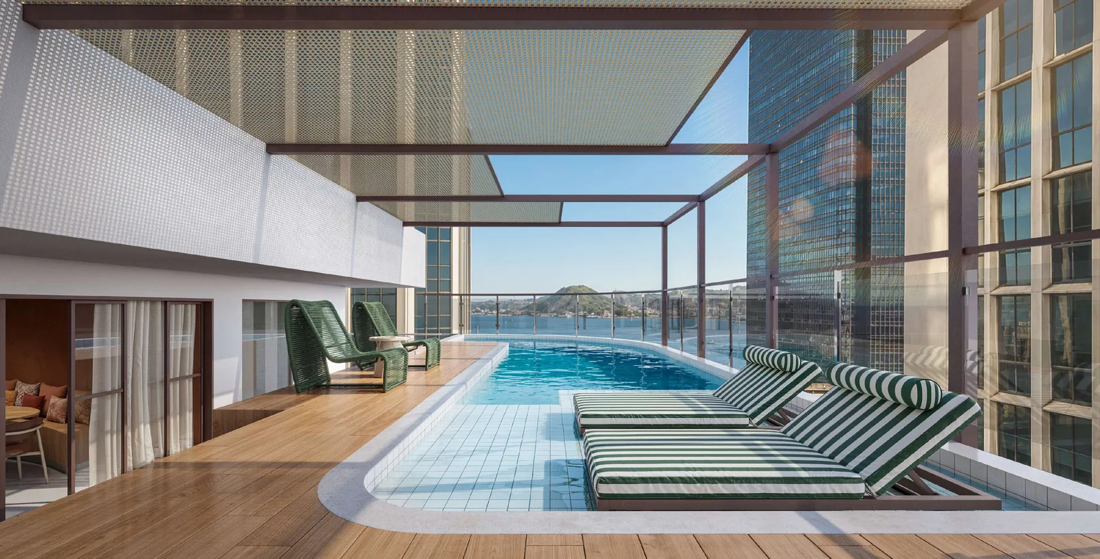 Piscina no rooftop do Sete Full Week Studios com vista para o Centro do Rio